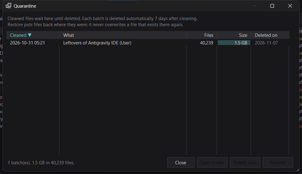 Quarantine dialog listing a cleaned batch with a Restore button